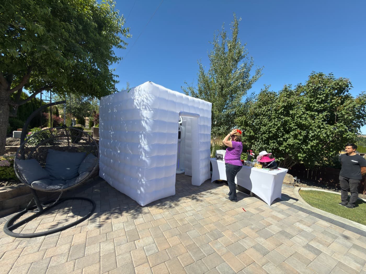 Finished photo booth backdrop and guest area inside the inflatable booth